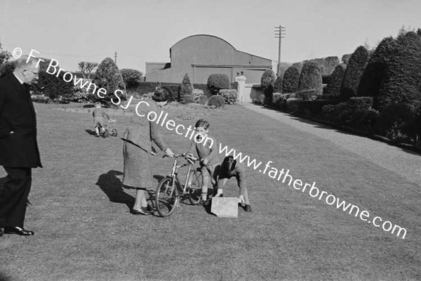 JOHN MALLICK PLAYING WITH HIS COUSINS O'NEILL & MRS O'NEILL AT MALLICKS ON CURRAGH